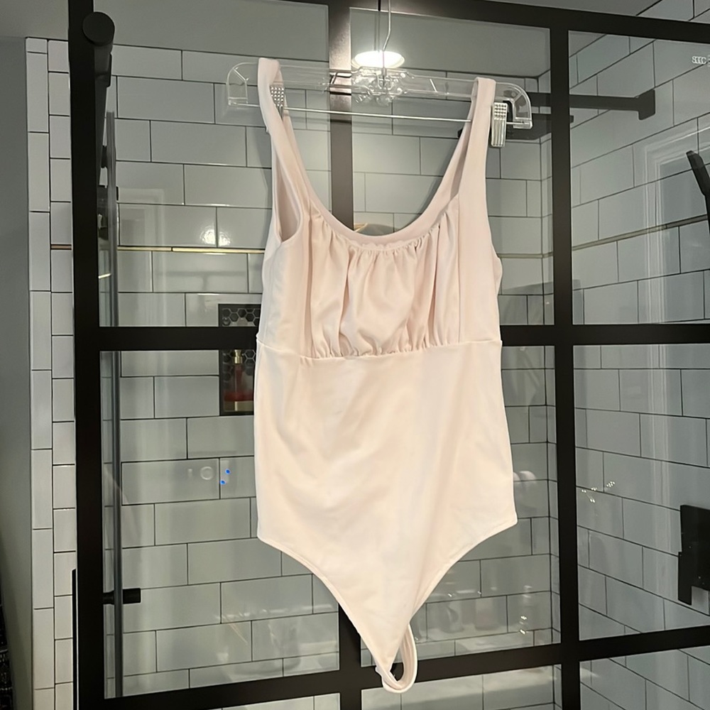 Abercrombie and Fitch soft white bodysuit.